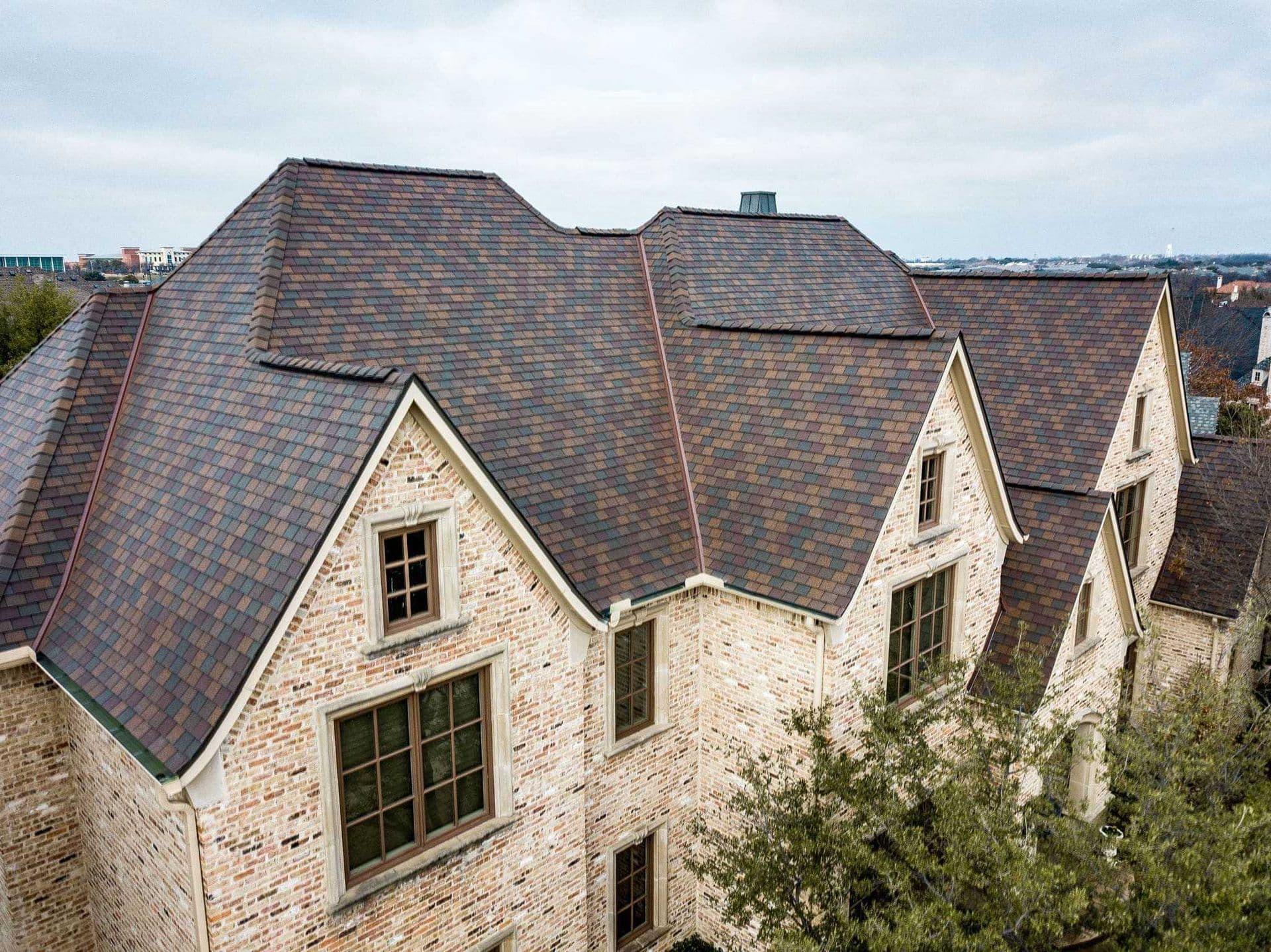 Drone view of a multi-tone architectural shingle roof installed by Modern Exterior Systems