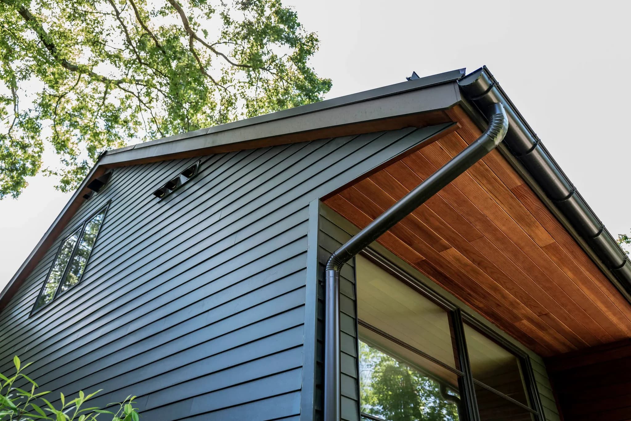 Gray siding corner finish, flashing and trim