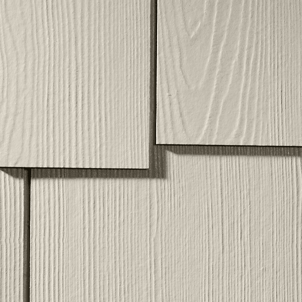 House-wrap layer behind a new Modex siding install