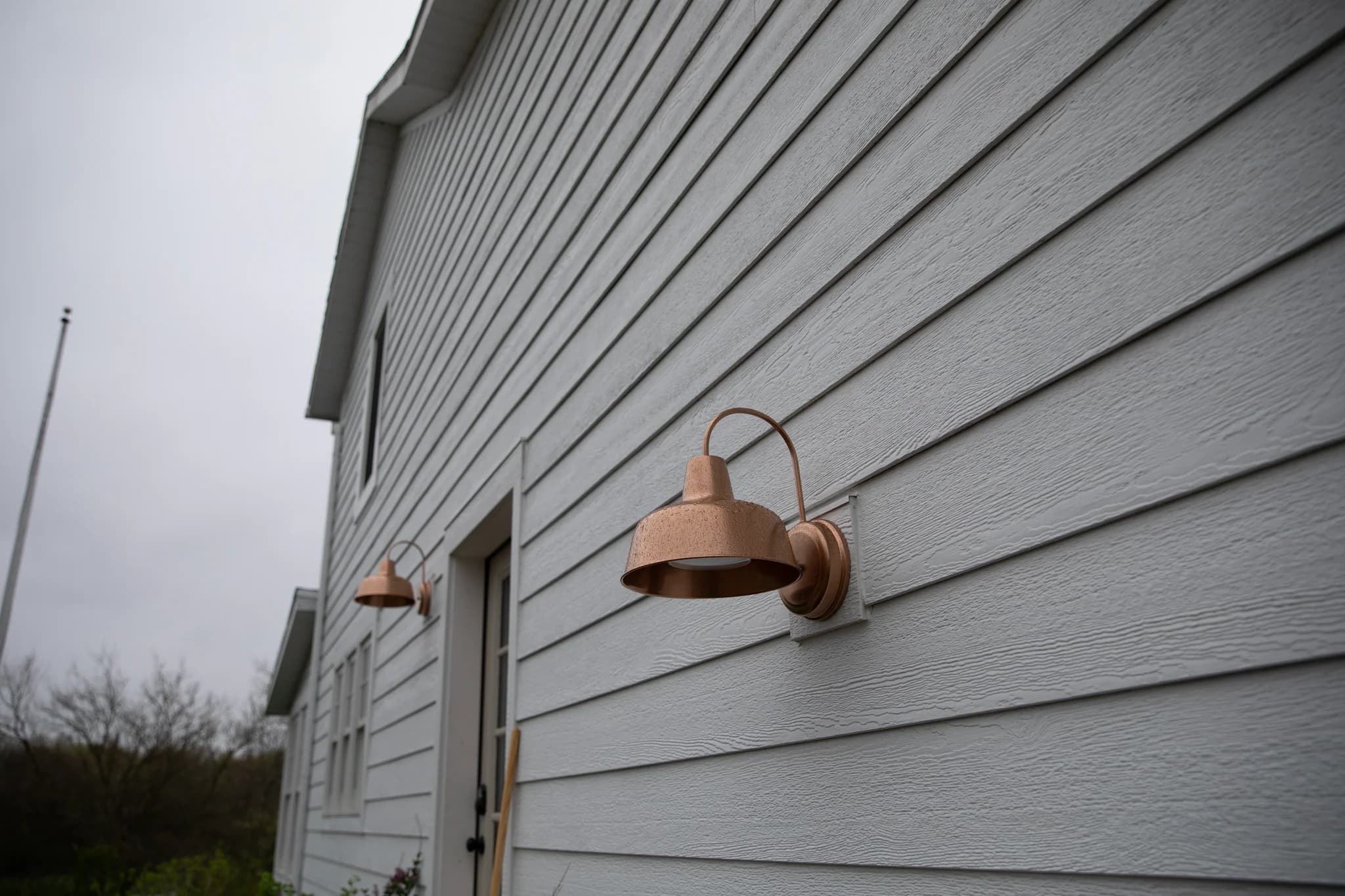 LP SmartSide beige shingle siding install on a Twin Cities home
