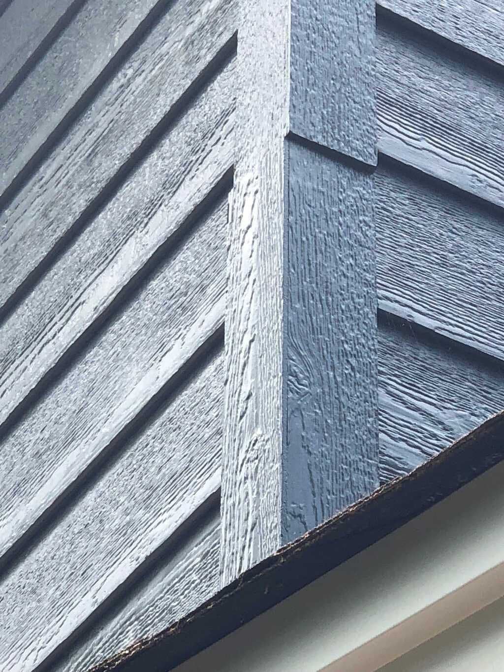 Corner detail of gray LP SmartSide engineered wood siding